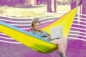 Female student in a hammock on campus