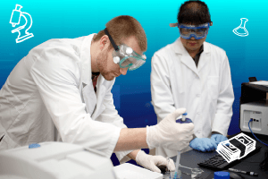 An IUE student works in a lab under supervision
