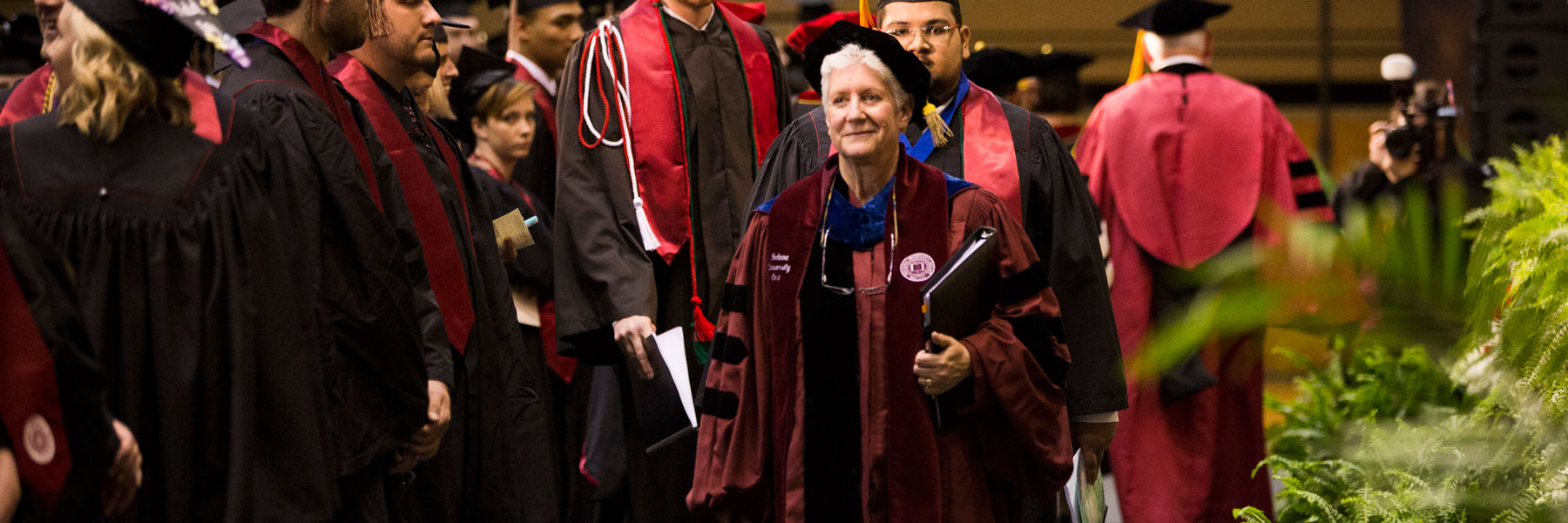 IU East Chancellor Kathryn Girten leads students at Commencement.