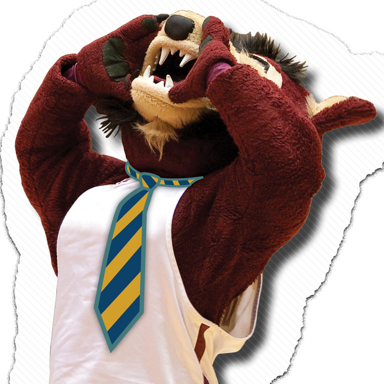 IU East Rufus Mascot: Putting his hands near mouth like he is shouting. Rufus is wearing a basketball white jersey with a blue and gold neck tie. 
