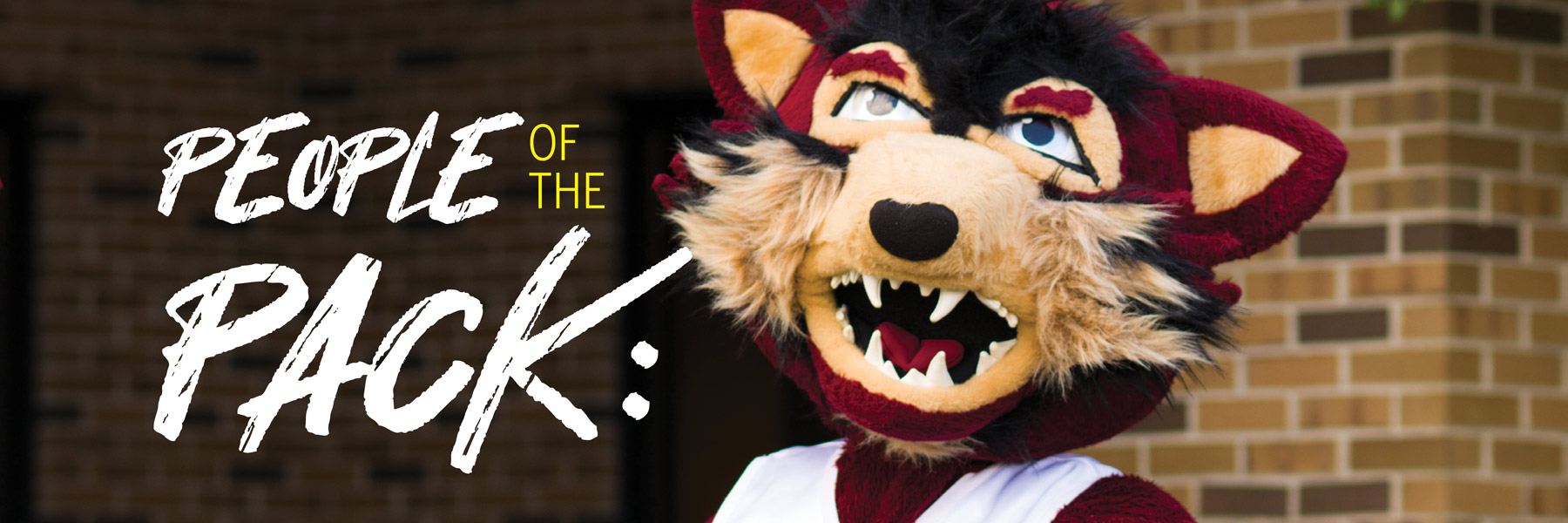 Rufus the Red Wolf on the IU East Campus next to the words: People of the Pack.
