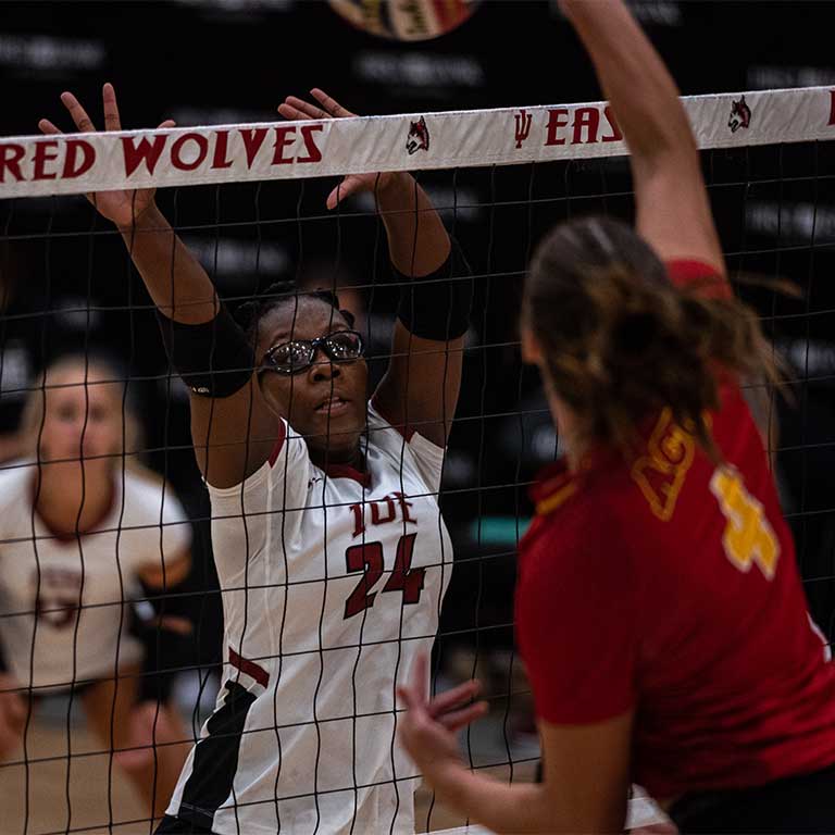IU East Volleyball athlete just after hitting the ball.